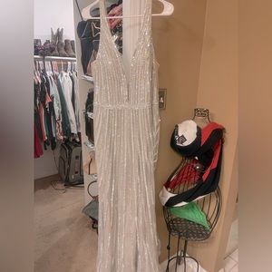 Stunning crystal embellished evening gown worn once. Size 18 fits likes a 16